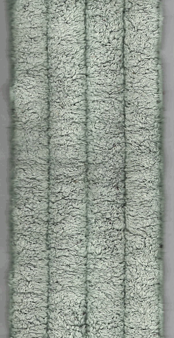 texture photo - a flat, green, shaggy  mop head